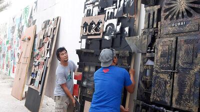 Darwin 'Japat' Guevarra, a highly regarded Filipino artist, creates a mixed media artwork that measures 9 meters by 3 meters. Japat painstakingly drew, cut out, rivited and painted each component which was then divided into seven parts and reconnected when put on display. The artwork was featured in the Outdoor Art Project 2012. Jeffrey E Biteng / The National