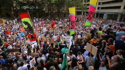Protesters take part in a climate change rally under the slogan 'Sack ScoMo!' in Sydney, New South Wales, Australia. EPA