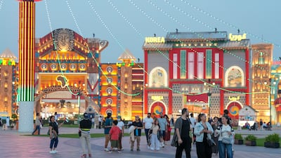 Visitors at the reopening ceremony for Global Village in Dubai. The attraction has extended its 30th season until the end of May, continuing its 'major milestone'. Pawan Singh for The National