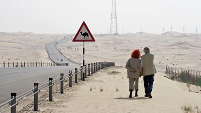 Christo and Jeanne-Claude scout for locations for the site of 'The Mastaba' in October 2007. Photo by Wolfgang Volz