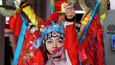 Above, dancers on opening day of the China Trade Week exhibition at Adnec. China is now the UAE’s No 2 trade partner after India, despite the bilateral trade volume declining last year by 11.5 per cent. Delores Johnson / The National