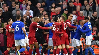 Liverpool and Leicester players scuffle at the final whistle. AFP