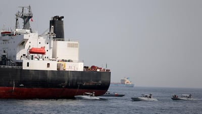 UAE Navy boats are seen next to the Saudi tanker Al Marzoqah off the Port of Fujairah, UAE, May 13, 2019. Reuters