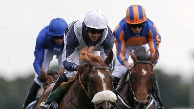 Jim Crowley, riding Ulysses, centre, wins the Juddmonte International Stakes from Churchill, right at York racecourse on August 23, 2017 in York, England. Alan Crowhurst / Getty Images