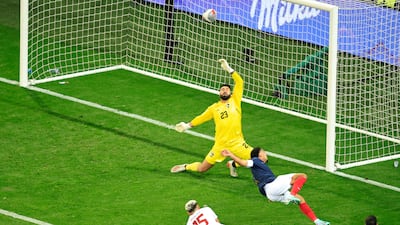 France midfielder Warren Zaire-Emery scores the third goal before going off injured. AFP