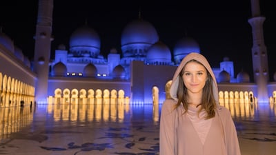 Lexie Alford at Sheikh Zayed Grand Mosque in Abu Dhabi during her mission to visit every country in the world. Courtesy lexielimitless.com