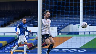 Cenk Tosun watches his shot hit the back of the net to put Everton in front.
