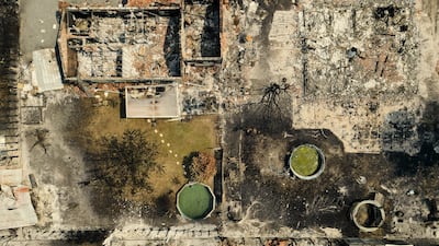 Burnt-out homes in Le Porge, France. Getty Images