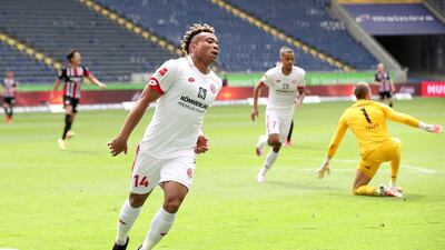 Mainz's Pierre Kunde Malong celebrates scoring his side's second goal. AP
