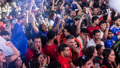 A lively fan zone is one way to experience the World Cup final. Ruel Pableo for The National