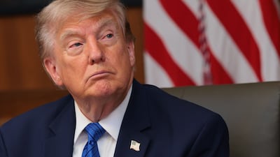 CAMP DAVID, MARYLAND - JULY 31: U. S. President Donald Trump listens to questions from reporters during a Cabinet meeting at Camp David, the presidential retreat, on July 31, 2026 in Camp David, Maryland. Trump convened members of his Cabinet at the presidential retreat as the war with Iran continues. Anna Moneymaker / Getty Images / AFP (Photo by Anna Moneymaker / GETTY IMAGES NORTH AMERICA / Getty Images via AFP)