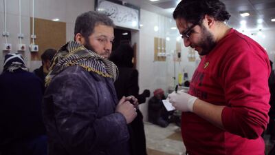 Dr Hamza Al Khatib, right, is the main subject of the film 'Madness in Aleppo'. Courtesy of Lina Sinjab