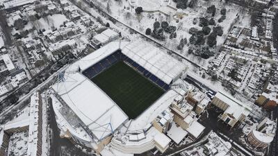 A snow-covered Stamford Bridge after the Premier League game between Chelsea and Manchester United had been postponed in December, 2010. Shutterstock