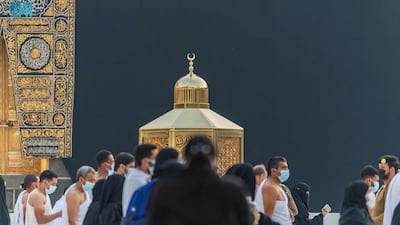 Pilgrims pass Maqam Ibrahim as they perform Umrah at the Grand Mosque in Makkah, Saudi Arabia. SPA