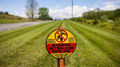 A sign marks the below-ground location of a Colonial Pipeline petroleum pipeline in Woodbine, Maryland, USA.The pipeline, traverses a distance of 8,850 kilometres and carries gasoline and jet fuel from Texas to New York. EPA