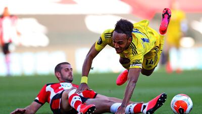 Jack Stephens - 5: Looked like defender might get over-run early on but stuck to his task, until late sending off for fouling Aubameyang when clean through. AFP