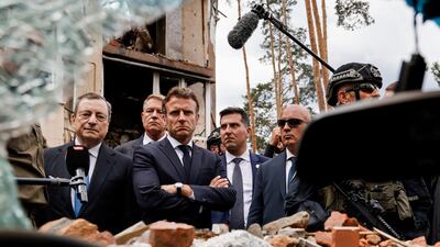 Italian Prime Minister Mario Draghi, left, and French President Emmanuel Macron on a visit to Irpin, outside Kyiv, June 16, 2022. The leaders of France, Germany, Italy and Romania arrived in Kyiv on Thursday in a show of collective European support for the Ukrainian people as they resist Russia's invasion. AP