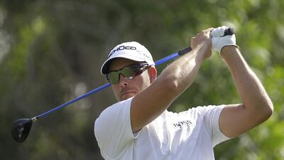 Henrik Stenson remains in the driver's seat at the DP World Tour Championship in Dubai with one round remaining. Kamran Jebreili / AP Photo
