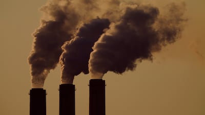 Emissions rise from the smokestacks at the Jeffrey Energy Center coal power plant near Emmett, Kansas. AP