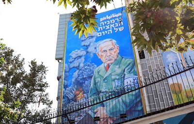 Anti-Israeli billboard depicting a cartoon of Israeli Prime Minister Benjamin Netanyahu at the Palestine Square in Tehran. EPA