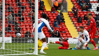 Liverpool striker Sadio Mane scores the opening goal. AFP