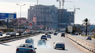 Libyans commute on a highway in the capital Tripoli, on February 3, 2020. AFP