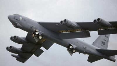 A USAF Boeing B-52H Stratofortress taking-off with undercarriage retracting and trailing-edge wing flaps lowered at the 1998 Fairford Royal International Air Tattoo RIAT. Getty Images
