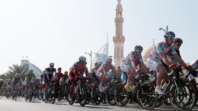 Taylor Phinney, far right, of team BMC races during the fourth stage of the Dubai Tour cycling race in 2014. Phinney went on to claim the overall classification title.