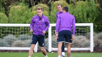 Christian Eriksen of Tottenham shown with the ball during the club’s training session on Wednesday. Matthew Childs / Action Images / Reuters