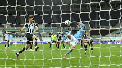 Torres scores his side's fourth goal. AP