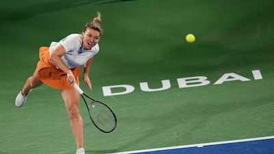 Simona Halep serves to Ons Jabeur. AP
