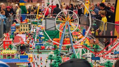 A giant Ferris wheel dominates this theme park display. AFP