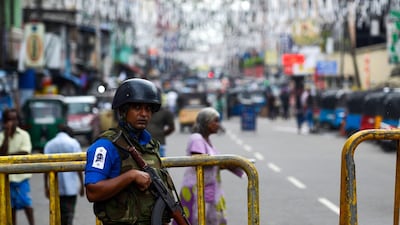 A Sri Lankan soldier in Colombo in April. Terror attacks have hurt the island's tourism trade and the national carrier predicts a loss. AFP