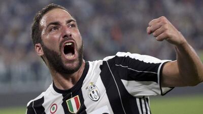 Juventus’ Gonzalo Higuain celebrates after scoring against Fiorentina on Saturday, August 20, 2016. Max Rossi / Reuters