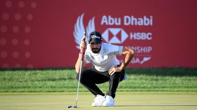 Francesco Laporta lines up a putt on the 18th green during the third round of the Abu Dhabi HSBC Championship presented by EGA. Getty Images