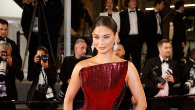 Pia Wurtzbach in gleaming red sequins. EPA