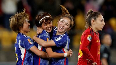 Hinata Miyazawa, second left, celebrates scoring Japan's third goal against Spain with Risa Shimizu and Honoka Hayashi. Reuters