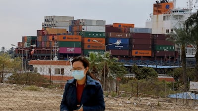 A ship is seen after sailing through Suez Canal as traffic resumes after a container ship that blocked the waterway was refloated, in Ismailia. Reuters
