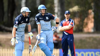 Former Australia captain Steve Smith, centre, at the crease during Sutherland's match against Mosman at Glenn McGrath Oval in Sydney. EPA