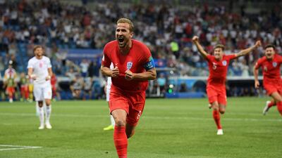 Harry Kane celebrates scoring England's winning goal against Tunisia. Matthias Hangst / Getty Images