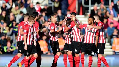 Sadio Mane of Southampton celebrates with teammates after scoring the opening goal in a 1-0 win over Stoke City on Saturday at St Mary's Stadium. Jamie McDonald / Getty Images