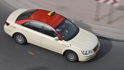 Taxi drivers in Dubai are angry at being charged Dh800 for a three-day training course that will also cost them through loss of earnings. Jaime Puebla / The National