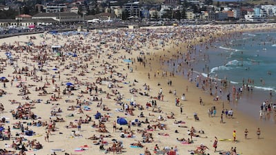 Crowds of people congregate on Bondi Beach on Christmas Day in Sydney, Australia. EPA