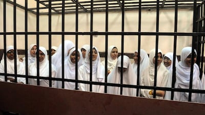 The clashes came a day after nearly two dozen Islamist women and girls, some as young as 15, were handed heavy prison sentences for protesting. Mahmoud Taha / EPA