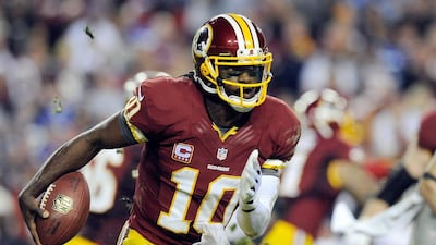 Robert Griffin III shown during an NFL game against the New York Giants in 2012. Patrick McDermott / Getty Images / AFP / December 3, 2012