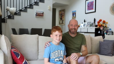 Andrew Burgess with his son Cyrus. All Photos: Chris Whiteoak / The National
