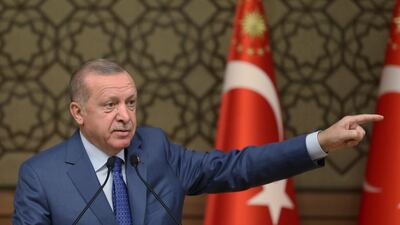 Recep Tayyip Erdogan speaks during a meeting at his presidential palace in Ankara. AP