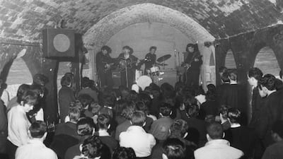 A packed crowd watching the Merseybeats playing at Liverpool's Cavern Club in 1963. Getty Images