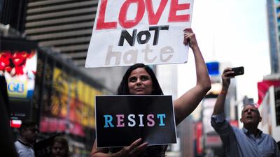 Protests against US President Donald Trump during a demonstration in 2017 in front of the US Army career center in Times Square, New York. Trump on August 25, 2017, signed a memo effectively barring transgender people from joining the US military. Jewel Samad / AFP
