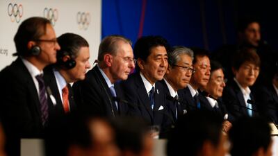 Back in Buenos Aires, Abe and the campaign team pose with Rogge, who stated that, perhaps, members of his organisation were put off by doping scandals in Spain and Turkey and voted for Tokyo given Japanese athletes' clean record so far. Victor Caivano / A???